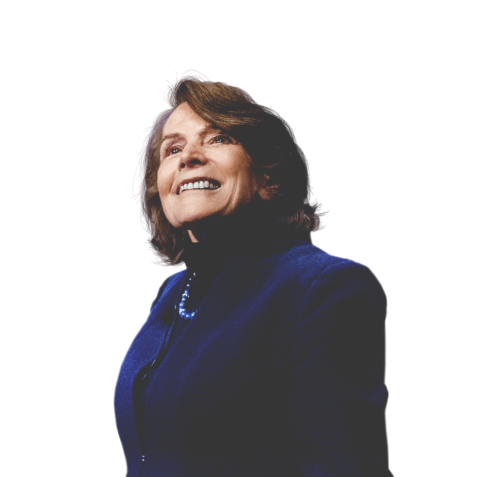 Sylvia Earle, marine biologist, and a background of a crashing wave