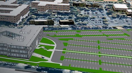 A 3D model of a sprawling office complex in gray and green