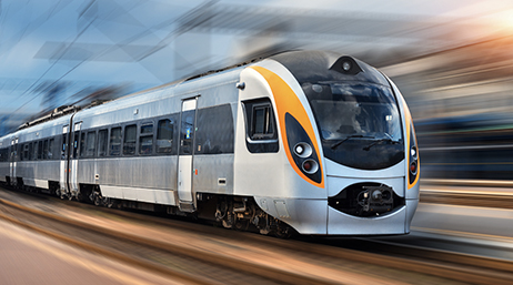 High speed passenger train going through a station