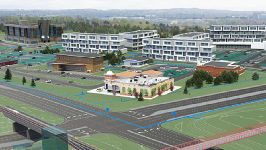 3D model of a large college campus at the intersection of two major roads