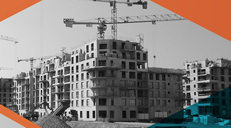 A black-and-white image of an apartment building under development surrounded by a diamond-shaped orange and blue shaded border