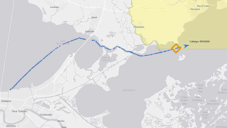 A country map in pale gray and white with transportation routes in blue