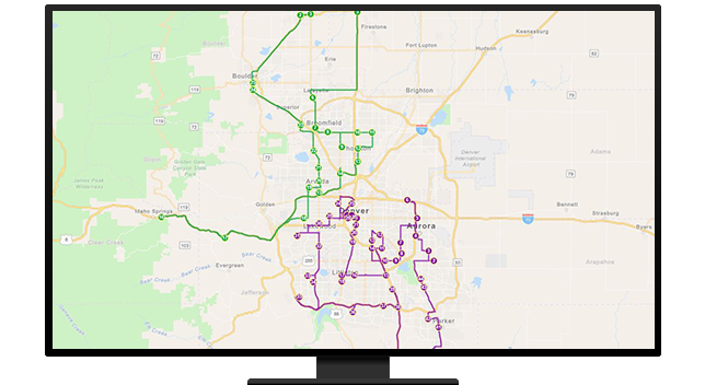 A graphic of a computer monitor displaying a state-level route map in green and purple