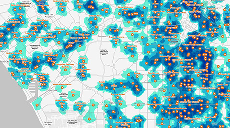 A heat map in blue and green on a white background, scattered with orange points