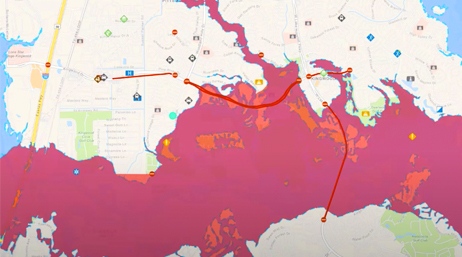 A road map with the disaster area highlighted in orange and pink 