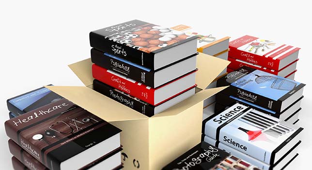 A pile of new textbooks on various subjects, some of which are still stacked within an open cardboard box